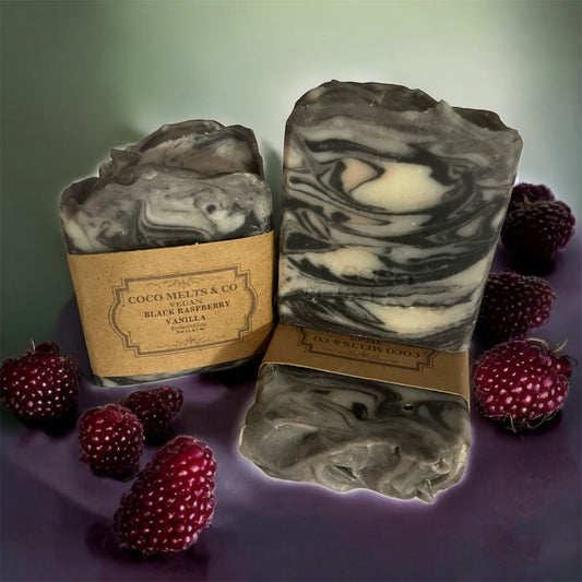 Luxury handcrafted Japanese sake soap bar with marble swirl design in pink, white, and black from French pink clay, kaolin clay, and activated charcoal, scented with black raspberry vanilla