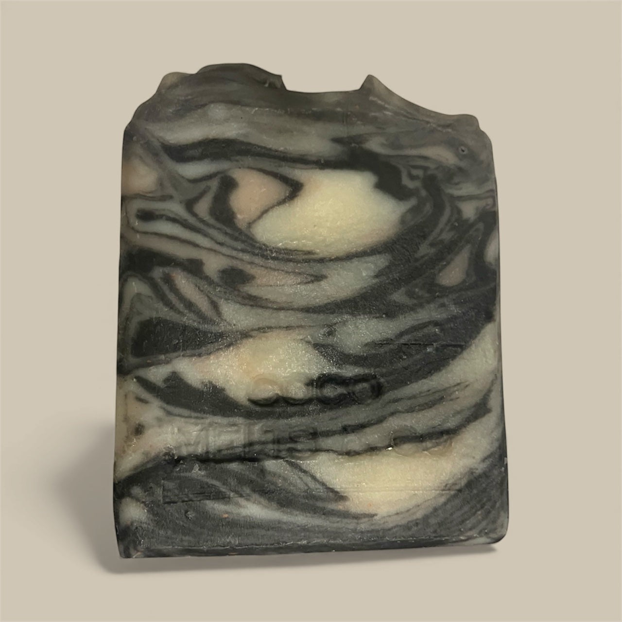 Handmade Japanese sake marble soap bar with activated charcoal and black raspberry vanilla scent