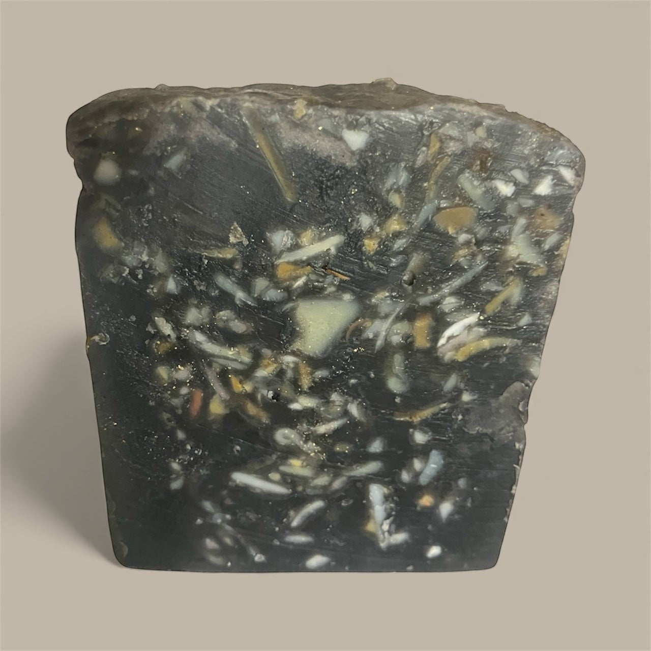 Eco-friendly upcycled soap bar made from recycled soap trimmings and activated charcoal Castile base, zero waste and fragrance-free